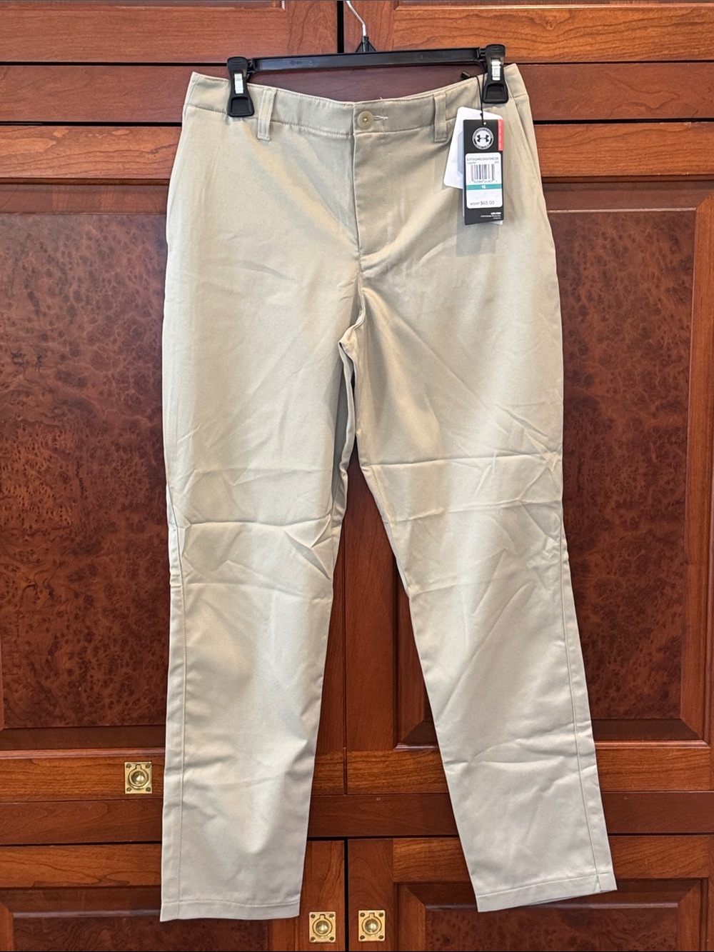 Boys under Armour Khaki colored golf Pants size 16, NWT, four pairs in total